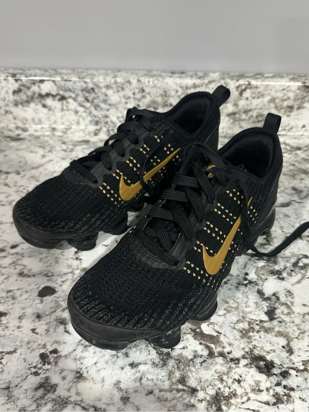 Nike Kids Black and Gold Swoosh Knit Sneakers